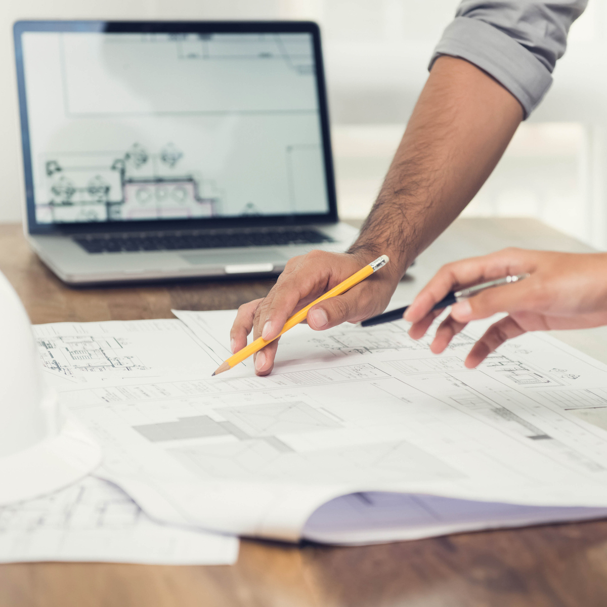 Architects discussing a project in the office
